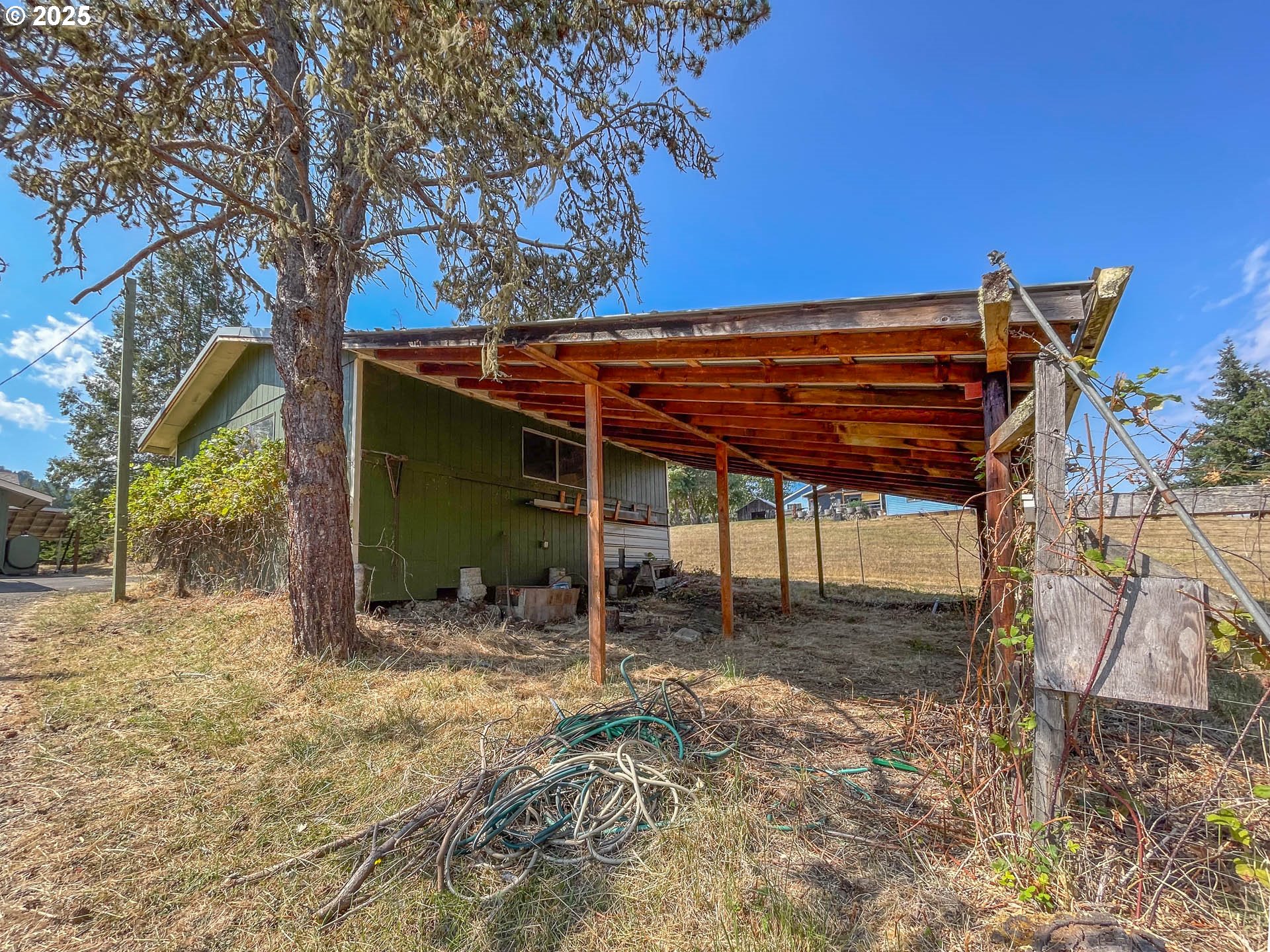 765 O C Brown Road Roseburg, OR 97470 - Photo 46 of 48 a view of a house with a backyard