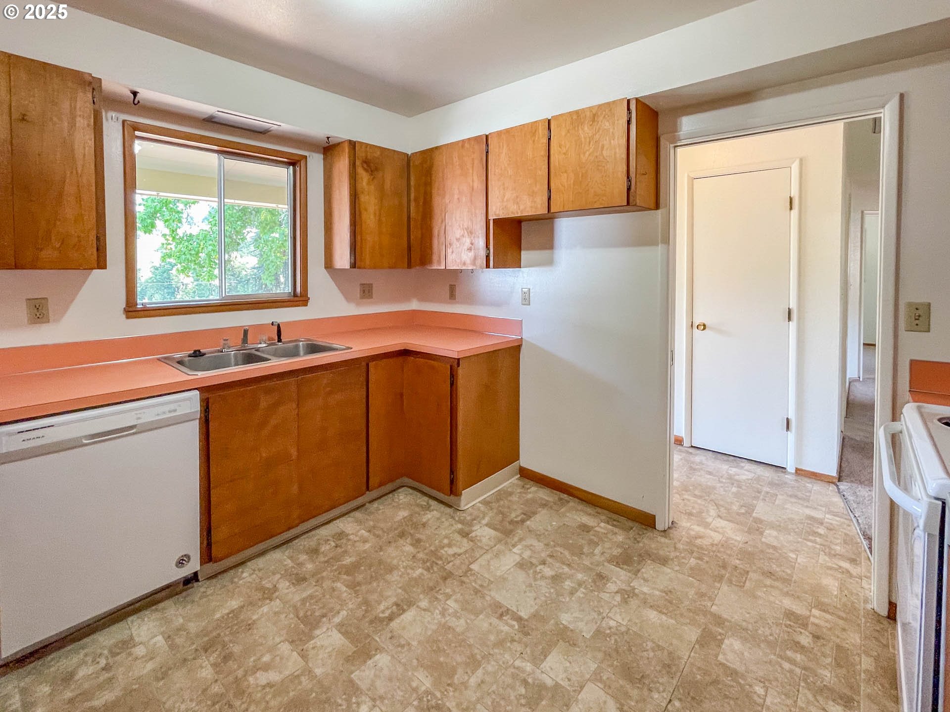 765 O C Brown Road Roseburg, OR 97470 - Photo 5 of 48 a kitchen with stainless steel appliances granite countertop a refrigerator sink and window