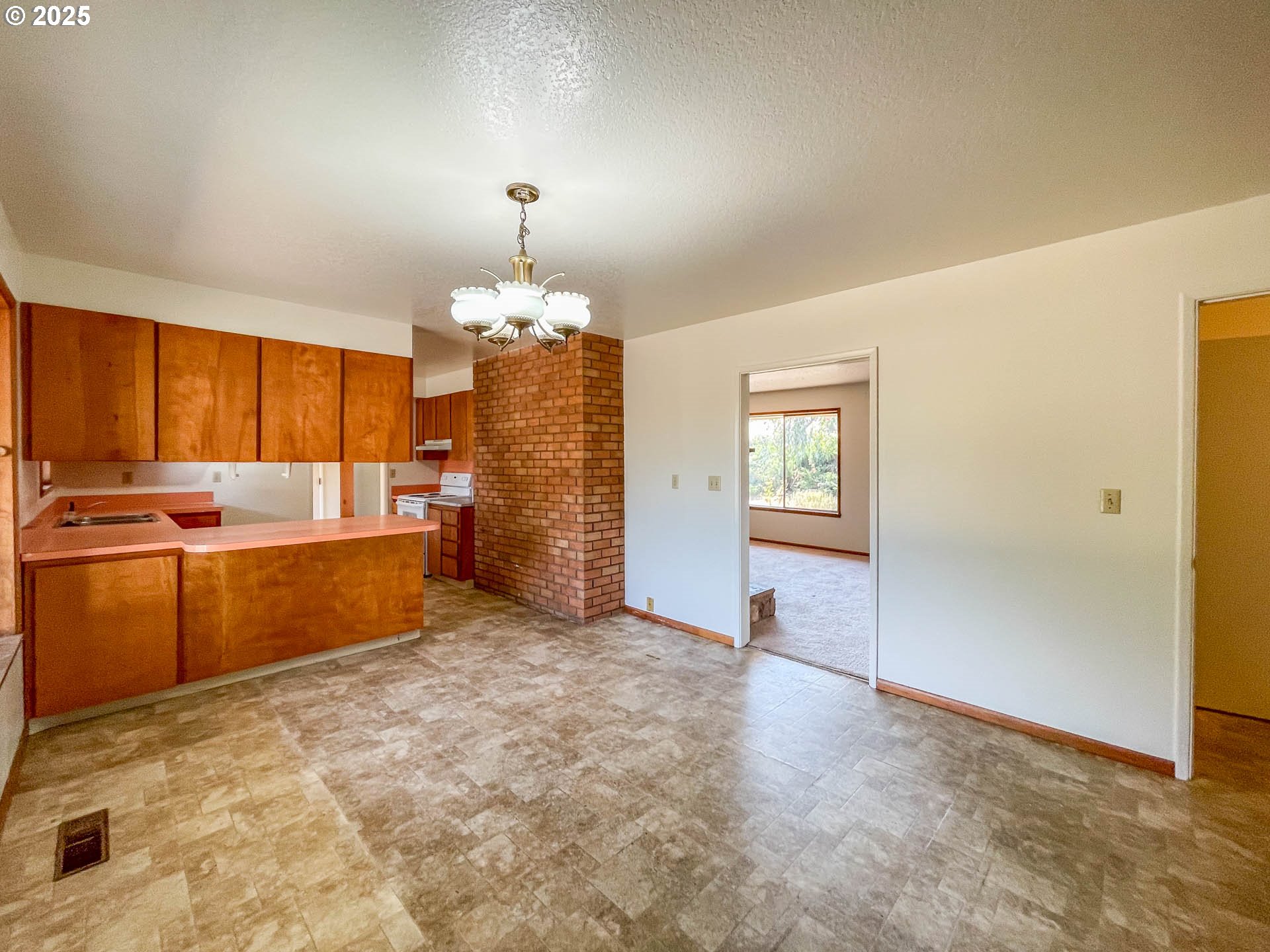 765 O C Brown Road Roseburg, OR 97470 - Photo 10 of 48 a view of a kitchen with a sink and cabinets