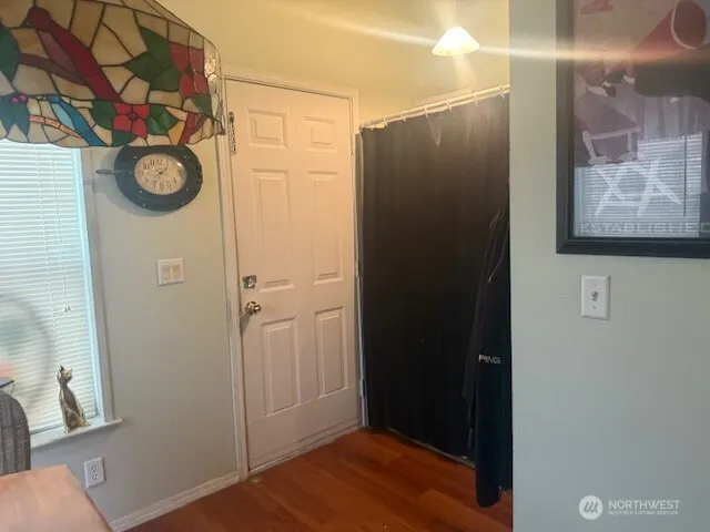 a view of a hallway with elevator