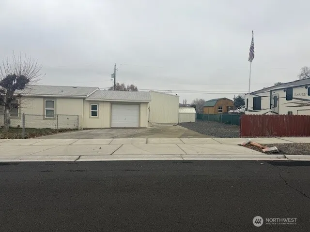 a front view of a house with a wooden floor