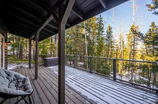a view of a balcony with furniture
