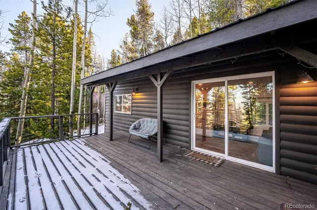 a view of deck with wooden floor and outdoor seating