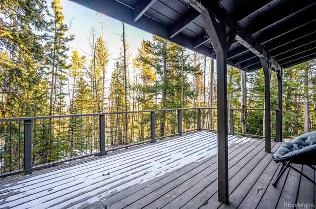 a view of balcony with wooden floor