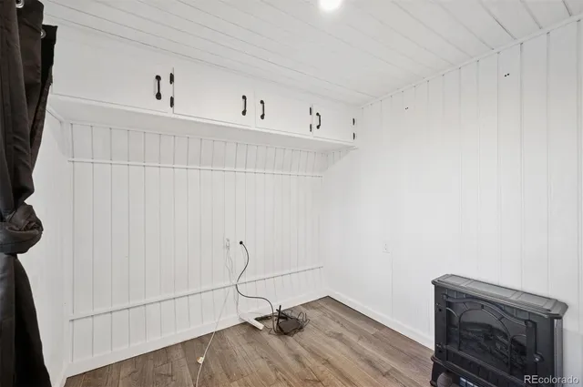 a view of a room with racks on the wall