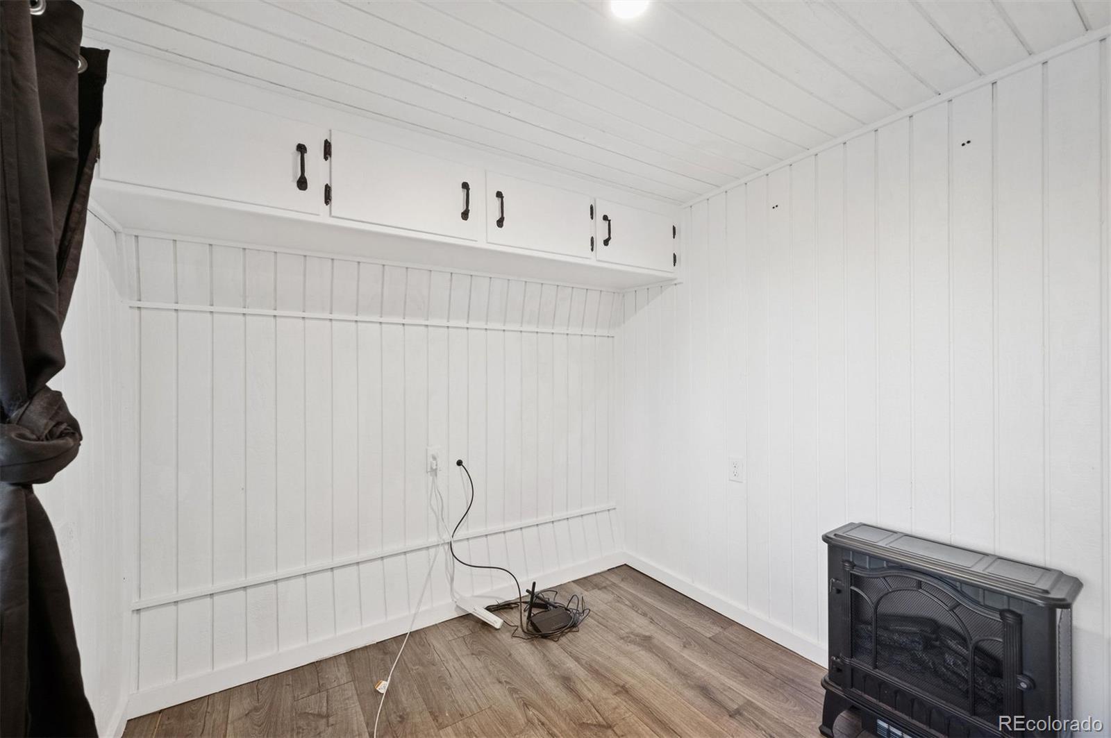 2334 Sinton Road Evergreen, CO 80439 - Photo 28 of 28 a view of a room with racks on the wall