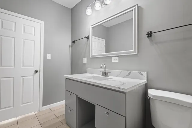 a bathroom with a sink and a toilet