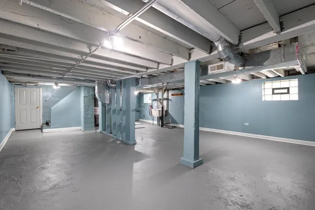 a view of a hallway with seating area