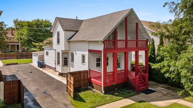 a view of a small yard in front of a house