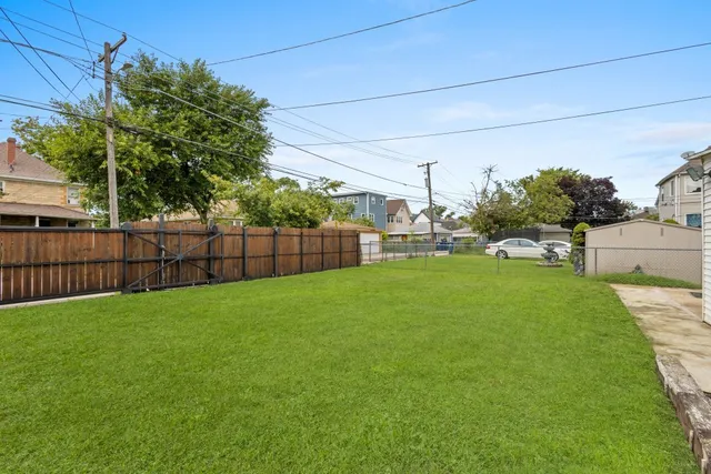 a view of a backyard with a garden