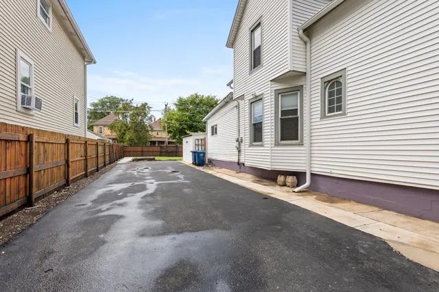 a view of a balcony with wooden floor