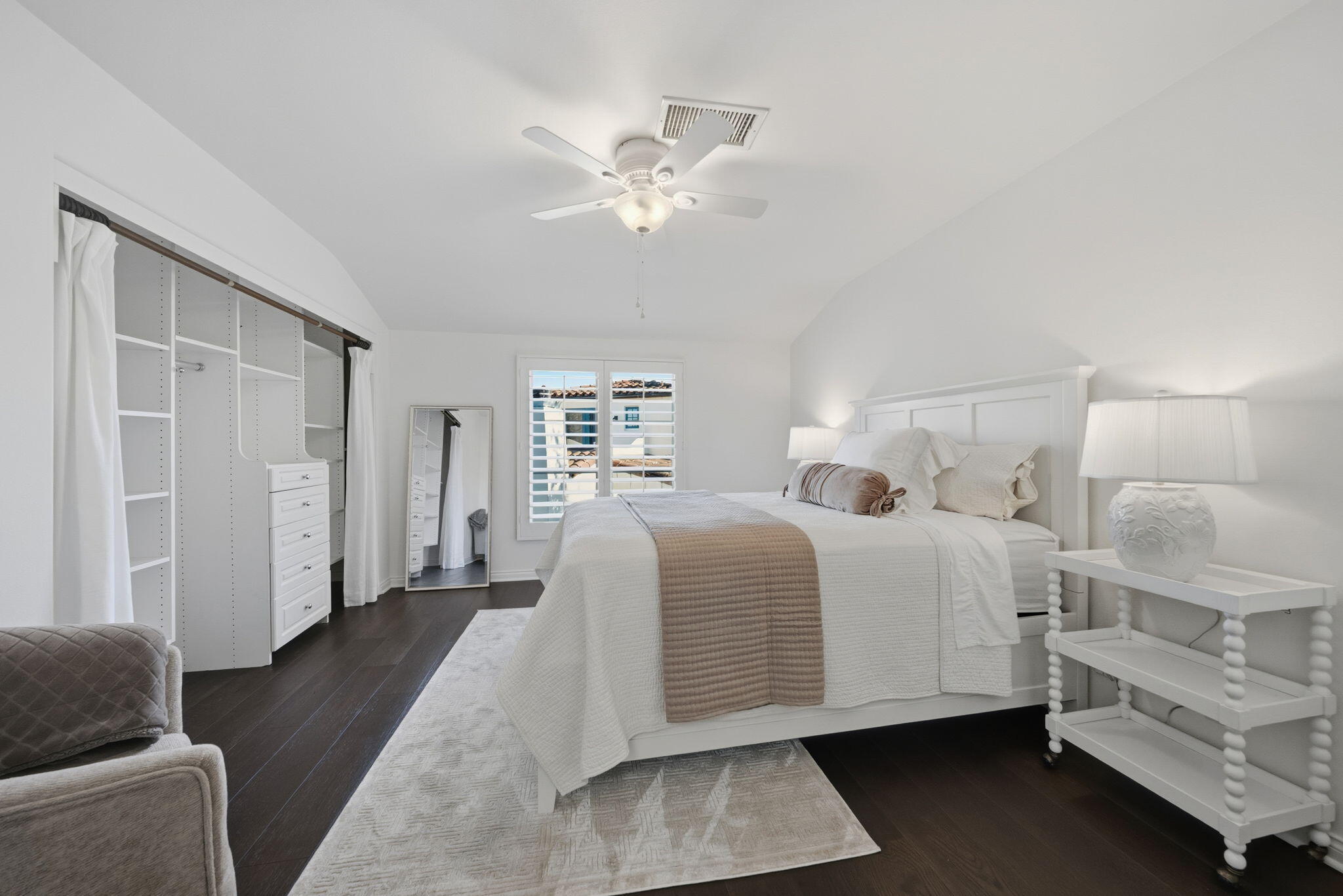 218 Santa Barbara Street, Unit D Santa Barbara, CA 93101 - Photo 16 of 25 a bedroom with a bed and a couch