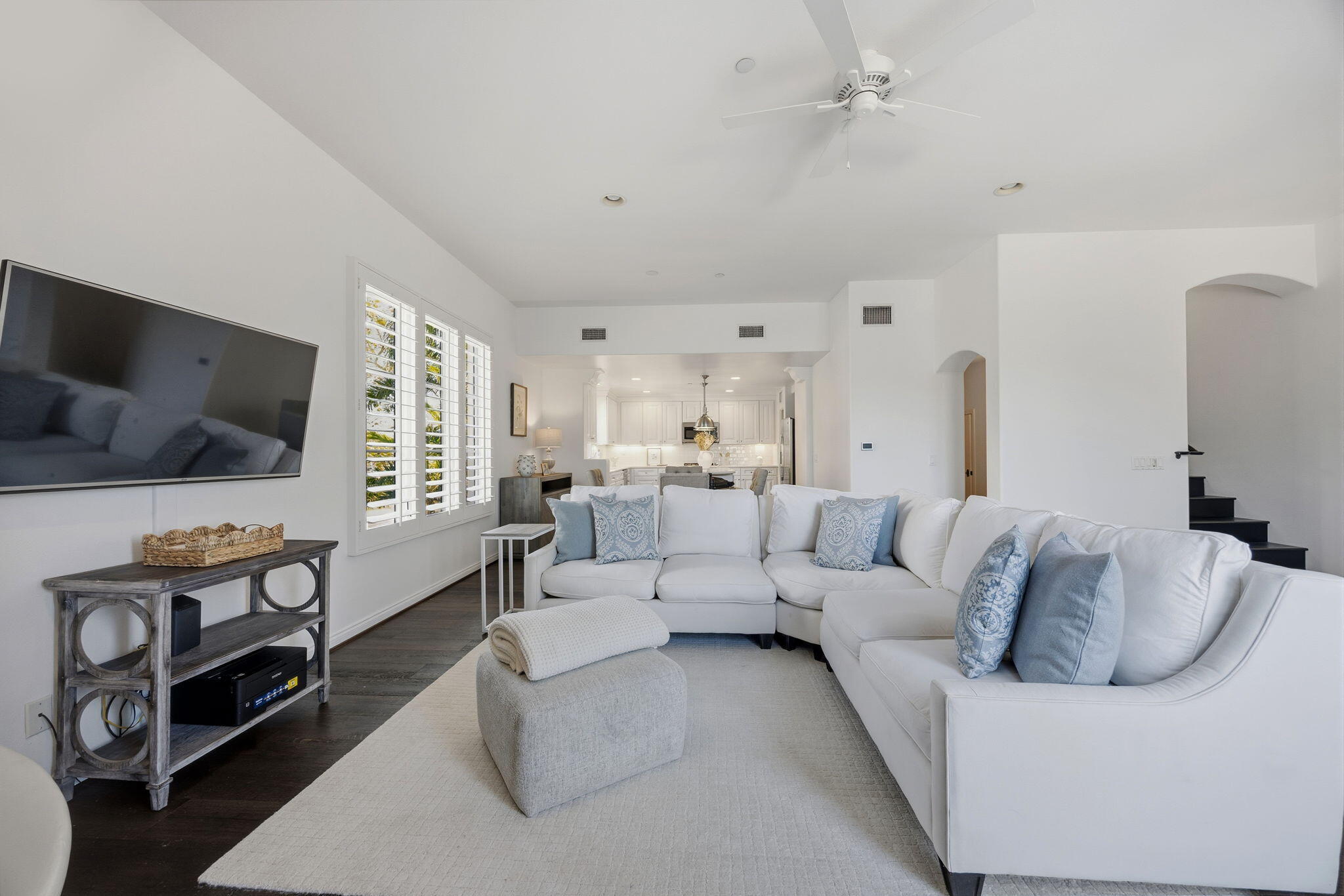 218 Santa Barbara Street, Unit D Santa Barbara, CA 93101 - Photo 6 of 25 a living room with furniture and a flat screen tv
