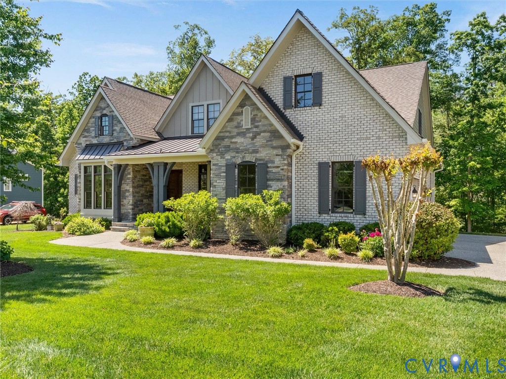 16131 Binley Road Midlothian, VA 23112 - Photo 2 of 99 a front view of a house with a yard