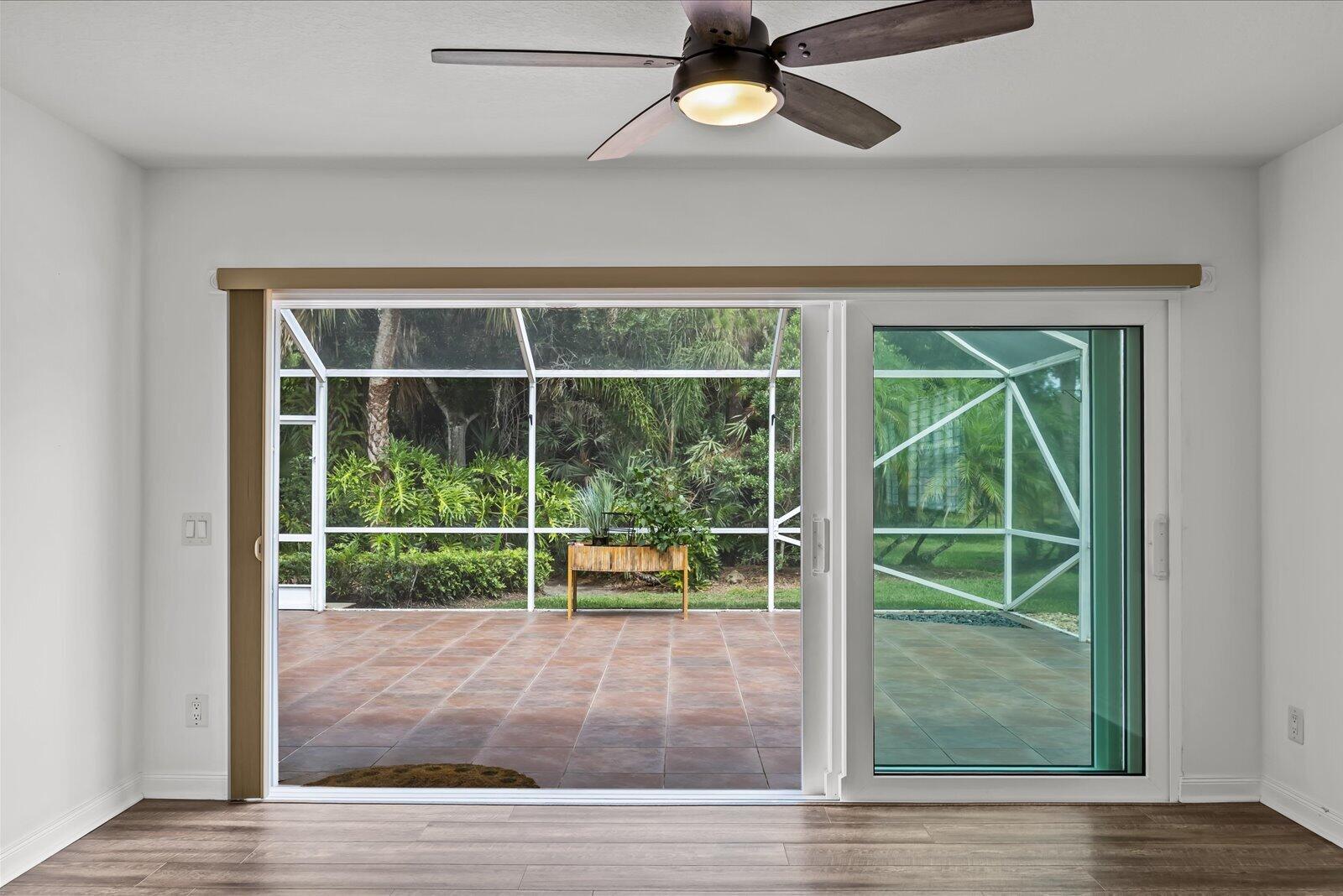 918 Southwest Balmoral Trace Stuart, FL 34997 - Photo 14 of 45 Impact slider w/ custom cellular shade