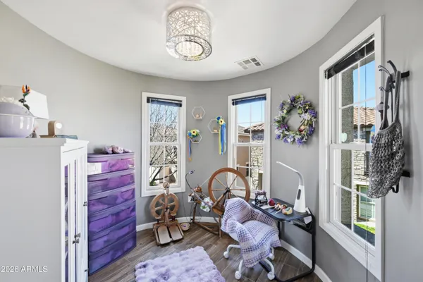 a bedroom with a bed and furniture