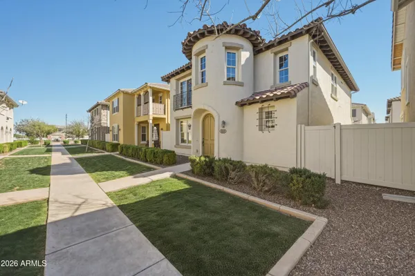 front view of a house with a yard