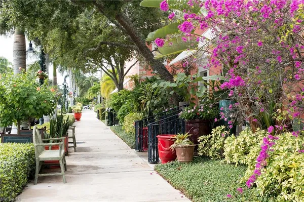 a view of street with sitting area
