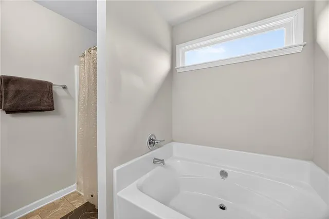 a bathroom with a bathtub