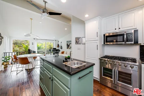 a bedroom with bed and window