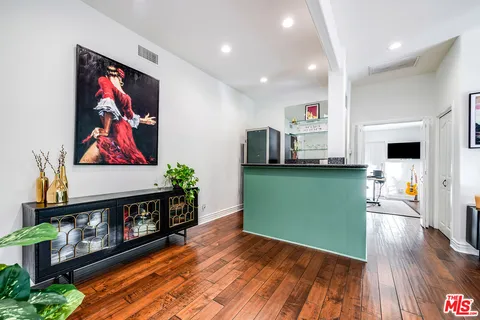 a outdoor living space with furniture and a fireplace