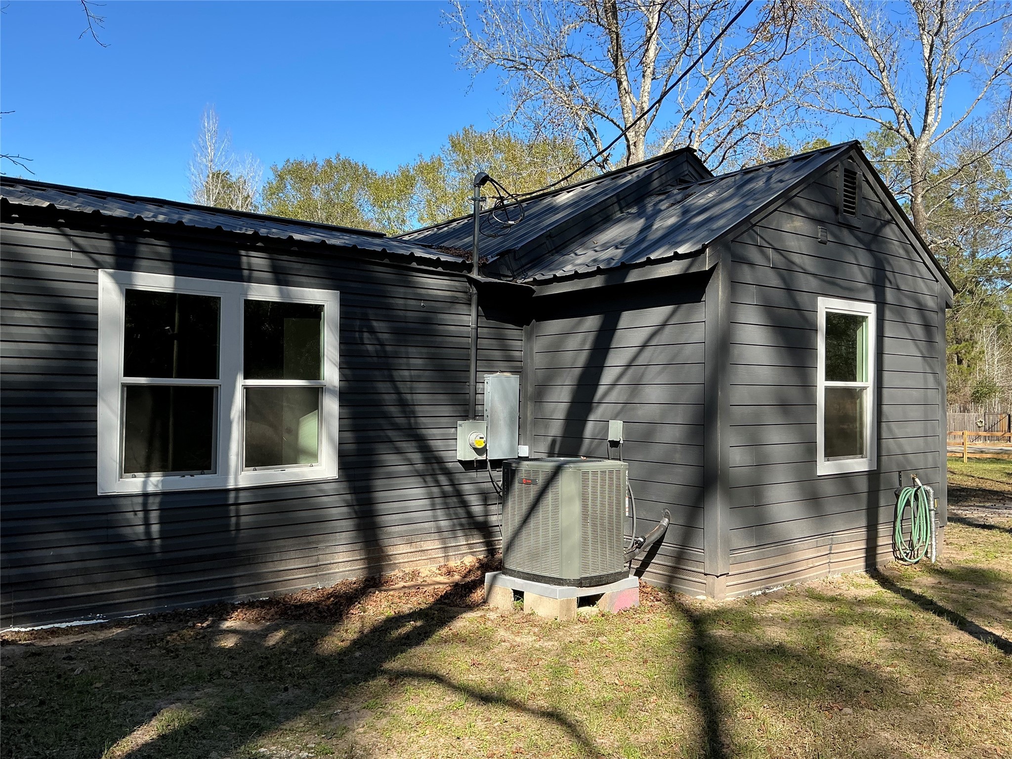 10928 L And M Road Montgomery, TX 77316 - Photo 26 of 31 a view of a chair and table in the patio