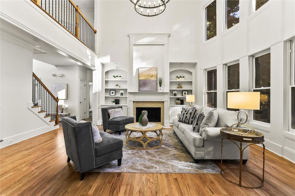 3184 Isleworth Trace Duluth, GA 30097 - Photo 12 of 75 a living room with furniture and a fireplace