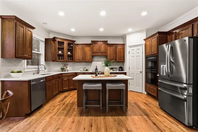 a view of a living room and wooden floor