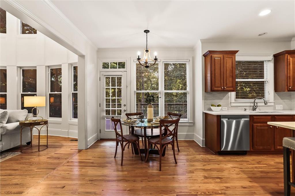 3184 Isleworth Trace Duluth, GA 30097 - Photo 18 of 75 a view of a dining room with furniture window and wooden floor