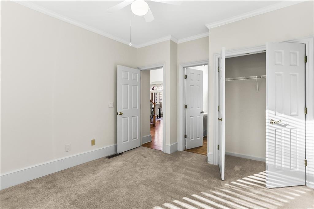 3184 Isleworth Trace Duluth, GA 30097 - Photo 22 of 75 an empty room with closet
