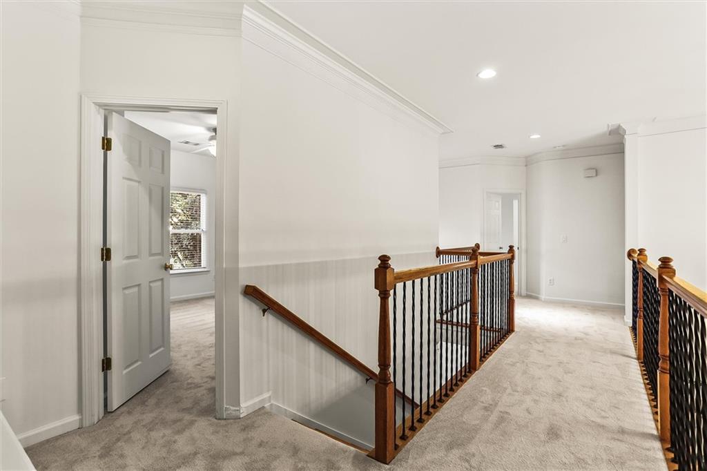 3184 Isleworth Trace Duluth, GA 30097 - Photo 26 of 75 a view of a hallway with closet and entryway