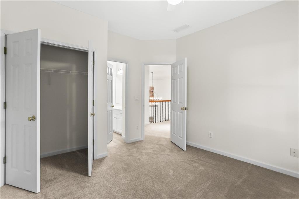 3184 Isleworth Trace Duluth, GA 30097 - Photo 45 of 75 a view of an empty room