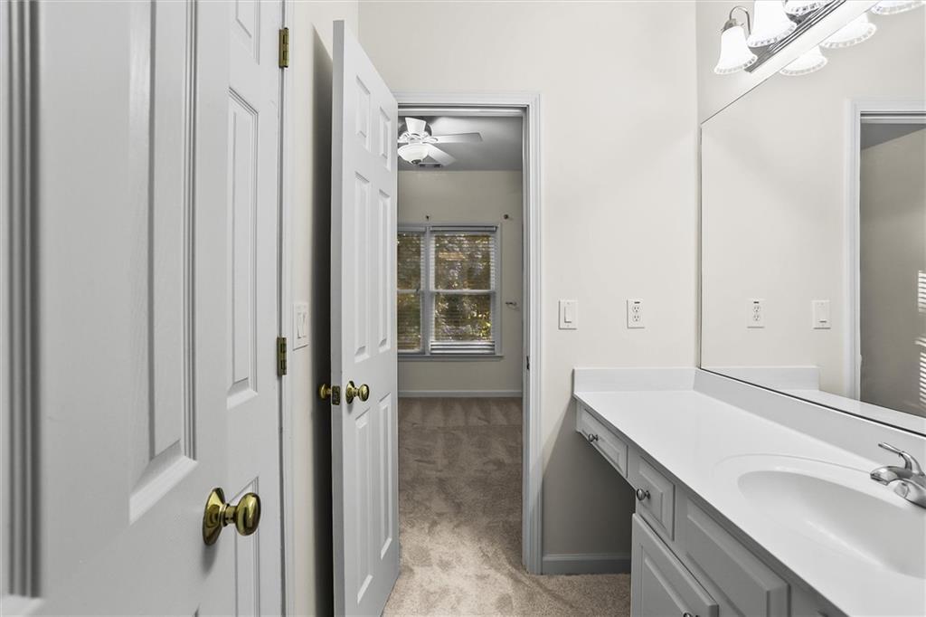 3184 Isleworth Trace Duluth, GA 30097 - Photo 46 of 75 a bathroom with a tub and shower