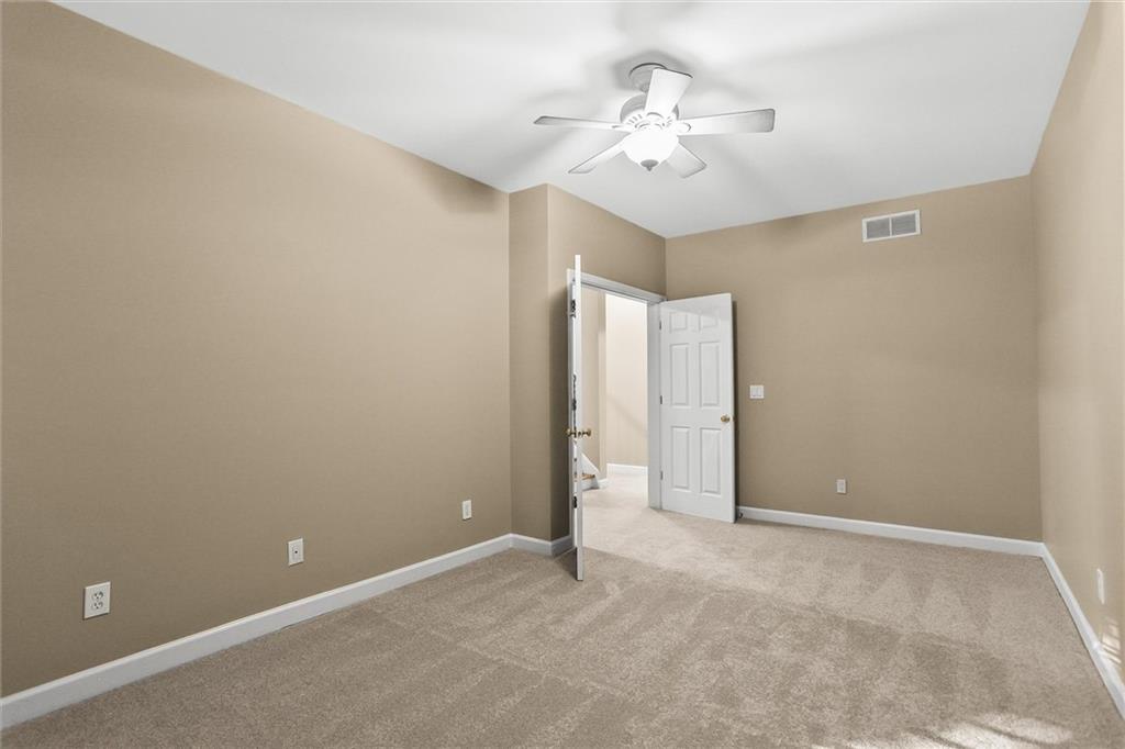 3184 Isleworth Trace Duluth, GA 30097 - Photo 59 of 75 a view of an empty room