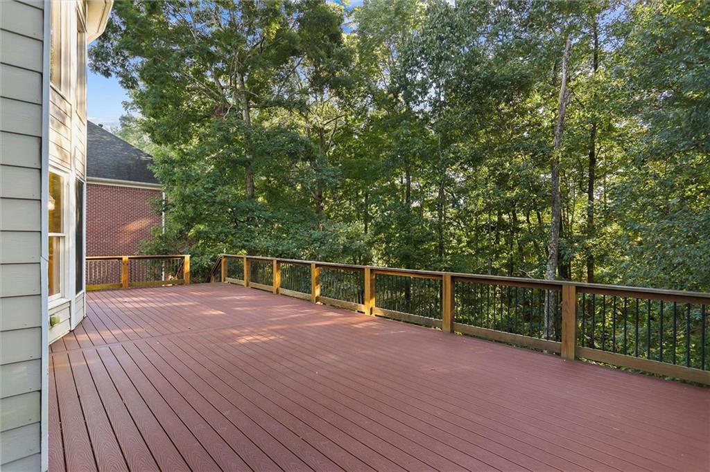 3184 Isleworth Trace Duluth, GA 30097 - Photo 70 of 75 a view of a house with a roof deck