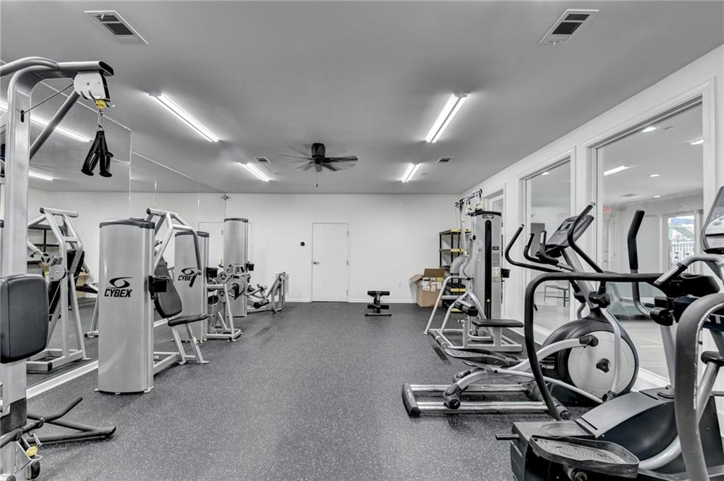 3184 Isleworth Trace Duluth, GA 30097 - Photo 71 of 75 a view of a room with gym equipment