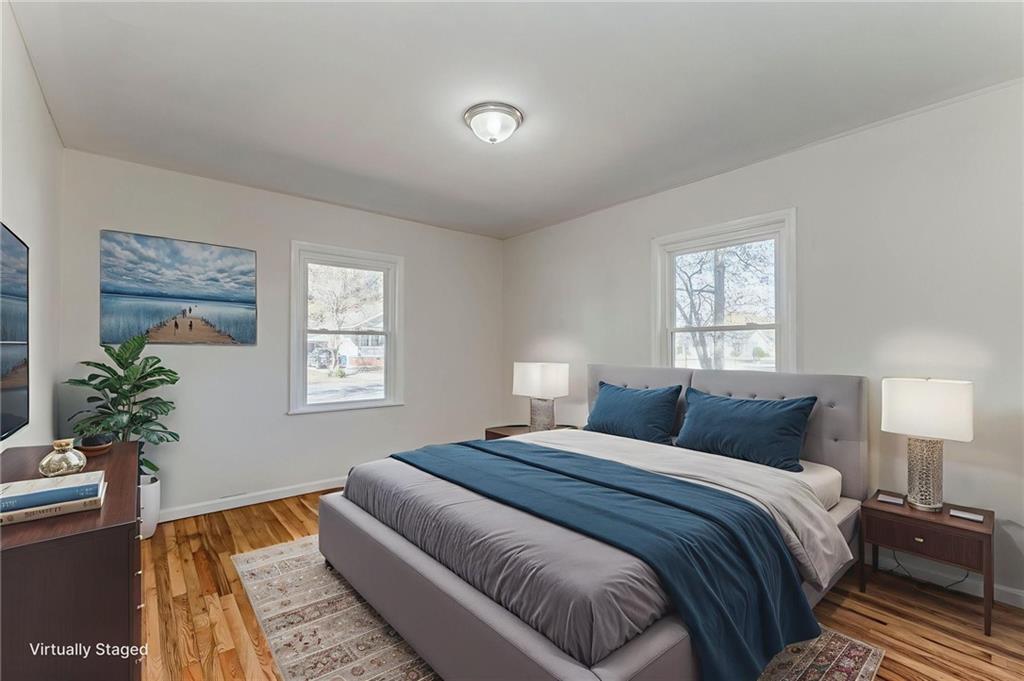 535 1st Street Northeast Rome, GA 30161 - Photo 13 of 34 a bedroom with a bed and a window