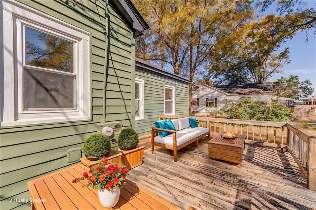 535 1st Street Northeast Rome, GA 30161 - Photo 23 of 34 a view of a wooden chairs on the deck