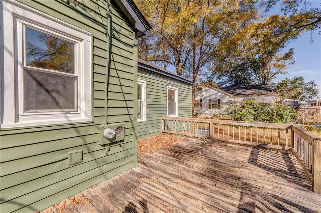 535 1st Street Northeast Rome, GA 30161 - Photo 24 of 34 a view of a house with a wooden fence