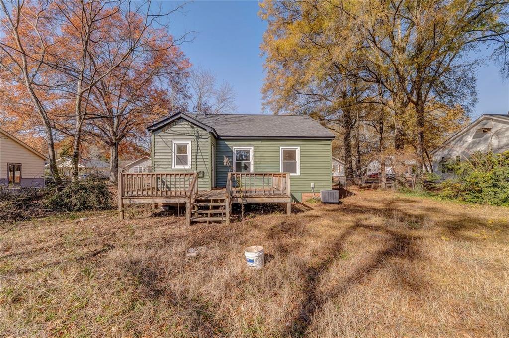535 1st Street Northeast Rome, GA 30161 - Photo 26 of 34 a view of a house with a yard and sitting area