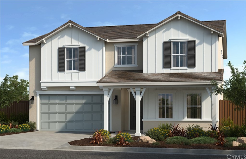 9678 Tuco Lane Riverside, CA 92508 - Photo 1 of 1 a front view of a house with garden