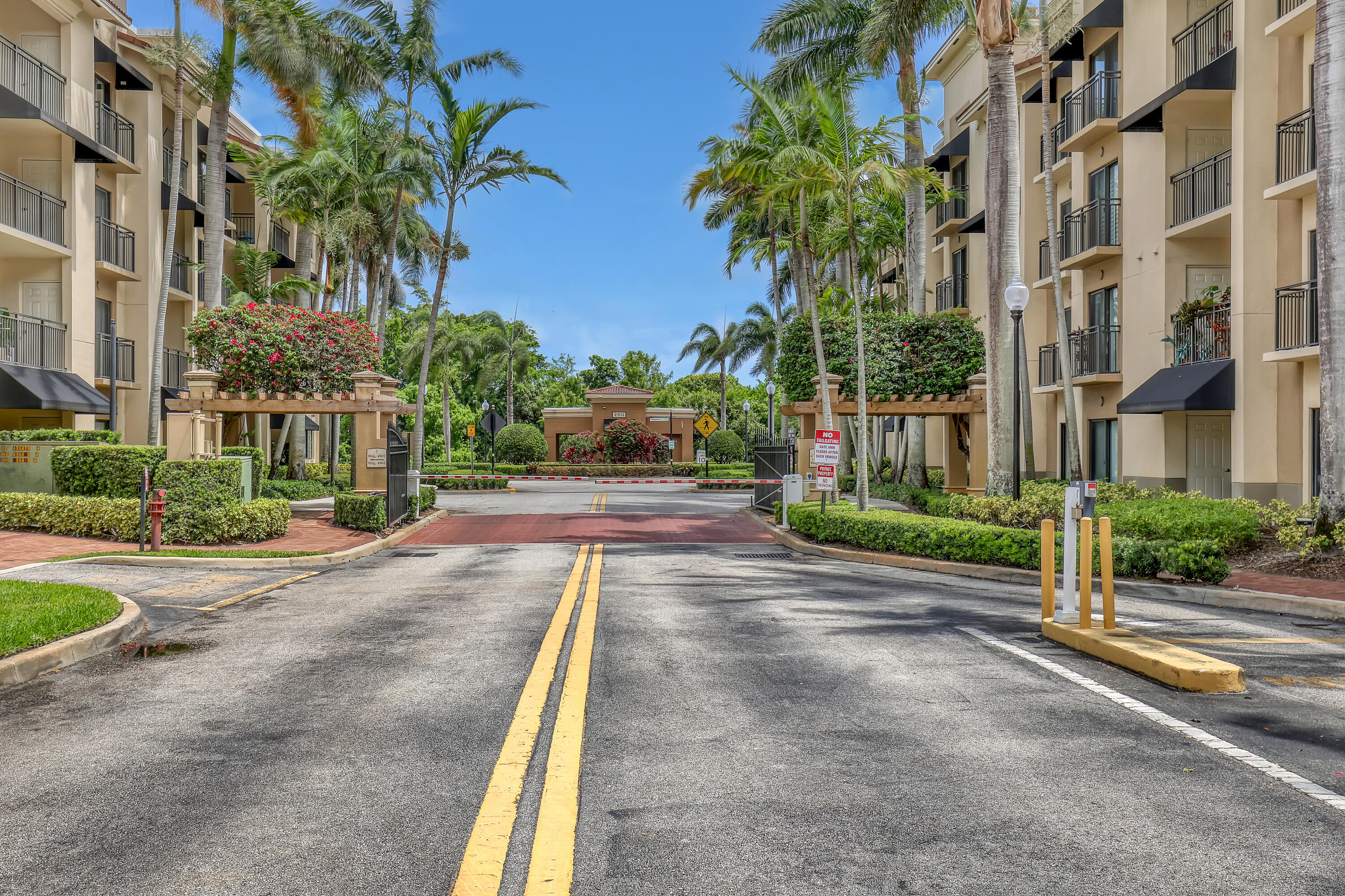 4903 Midtown Lane, Unit 3114 Palm Beach Gardens, FL 33418 - Photo 33 of 49 Gate Entrance