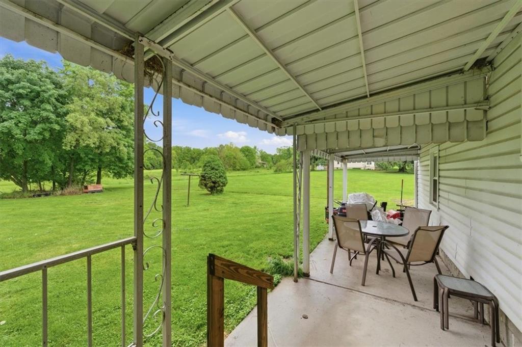 344 Winfield Road Cabot, PA 16023 - Photo 25 of 30 a porch with outdoor seating
