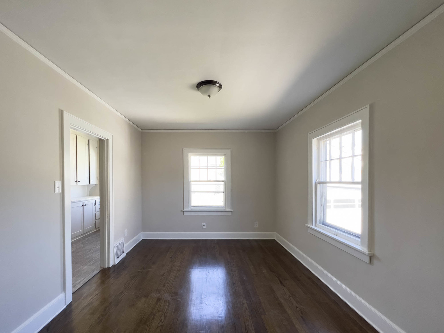 1214 Indiana Avenue St. Charles, IL 60174 - Photo 11 of 19 a view of an empty room with wooden floor and a window