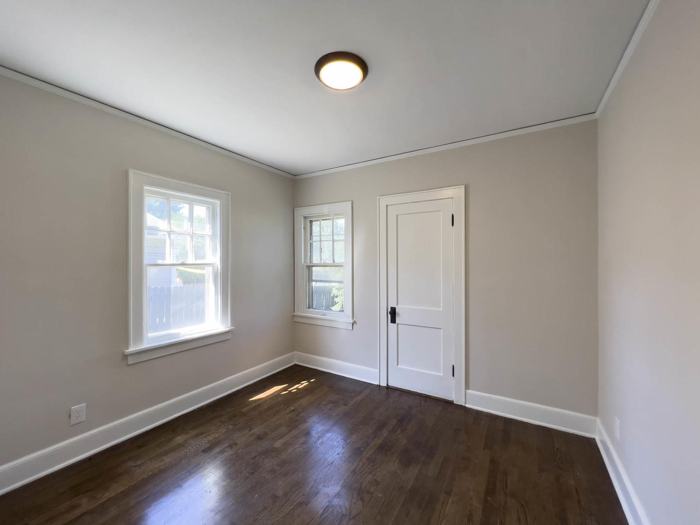 1214 Indiana Avenue St. Charles, IL 60174 - Photo 13 of 19 an empty room with wooden floor and windows