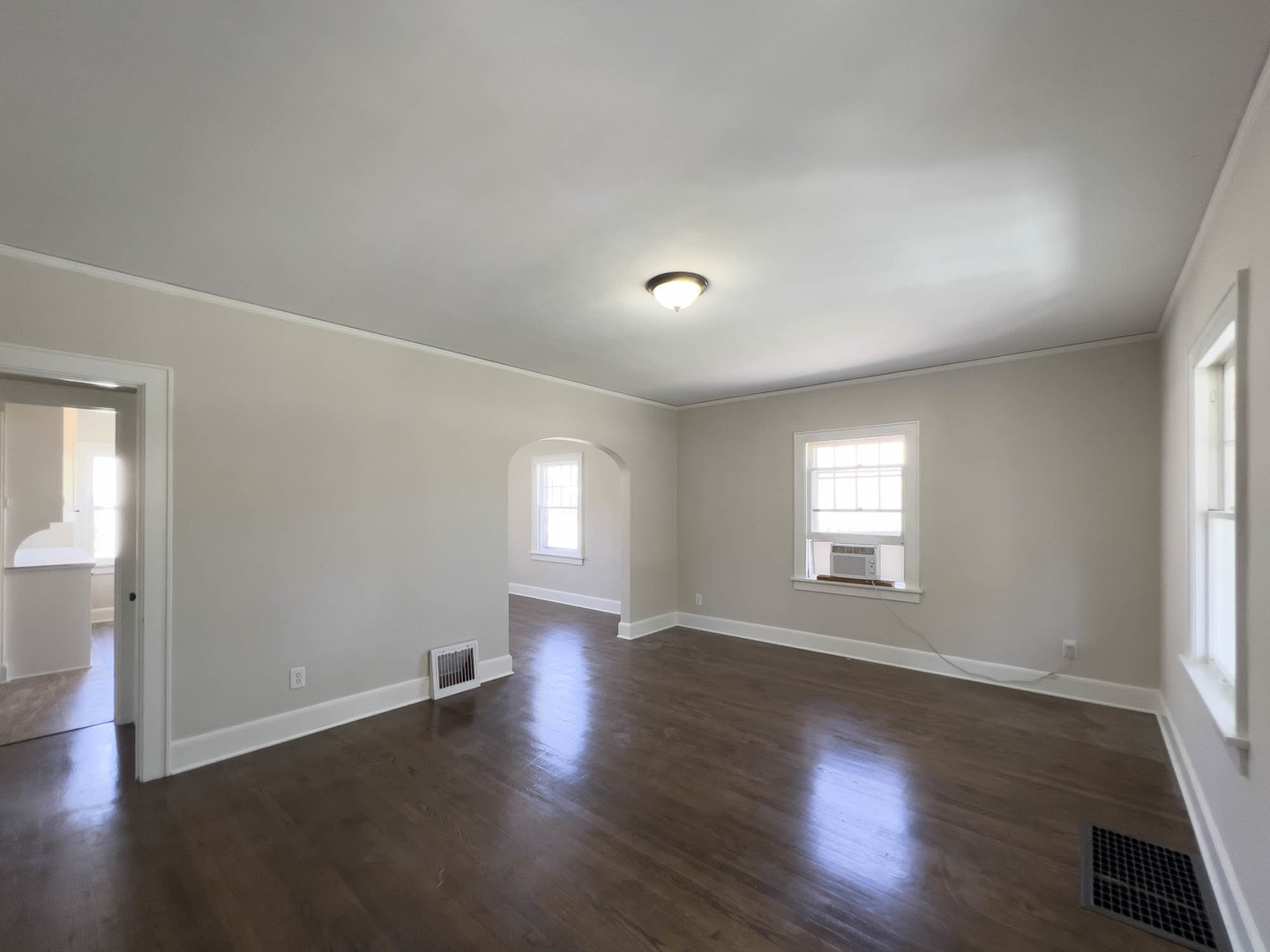 1214 Indiana Avenue St. Charles, IL 60174 - Photo 6 of 19 an empty room with wooden floor and windows