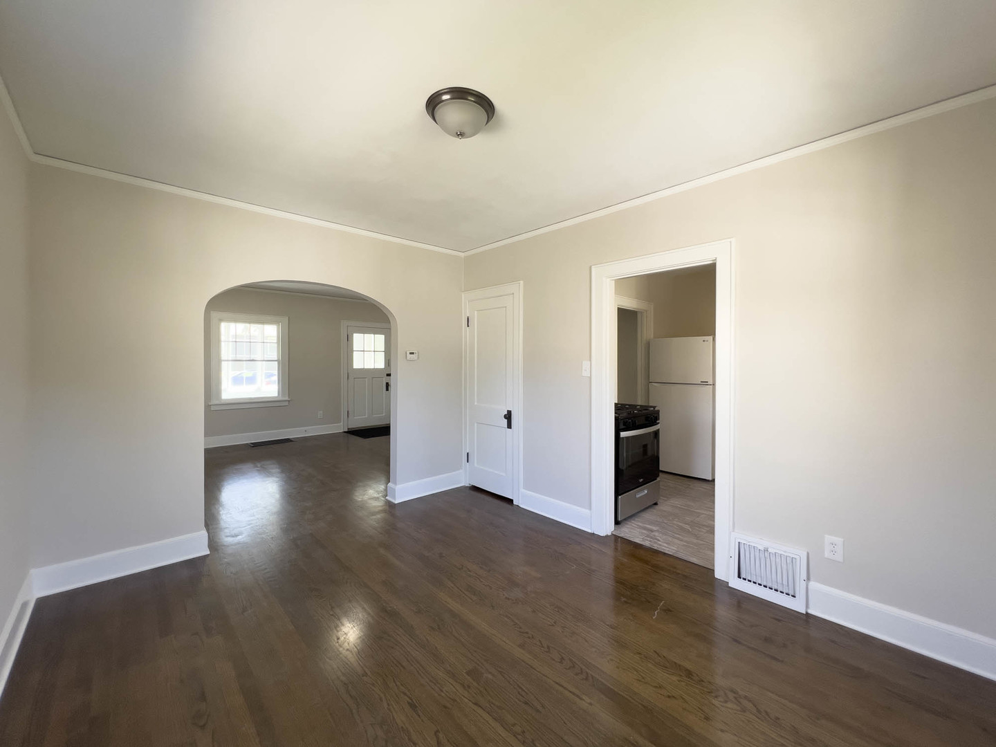 1214 Indiana Avenue St. Charles, IL 60174 - Photo 7 of 19 an empty room with wooden floor and mirror