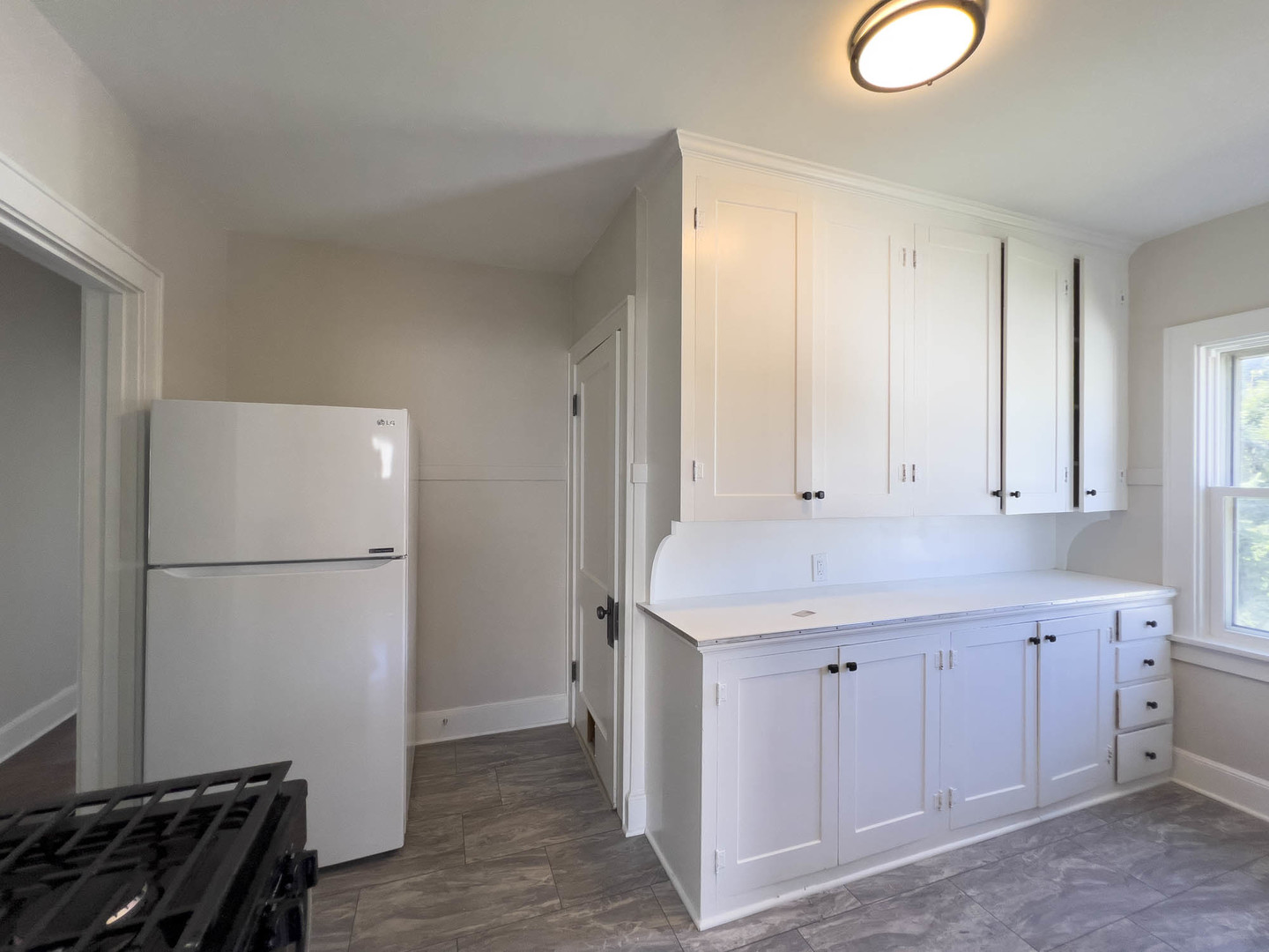 1214 Indiana Avenue St. Charles, IL 60174 - Photo 8 of 19 a view of cabinets with wooden floor