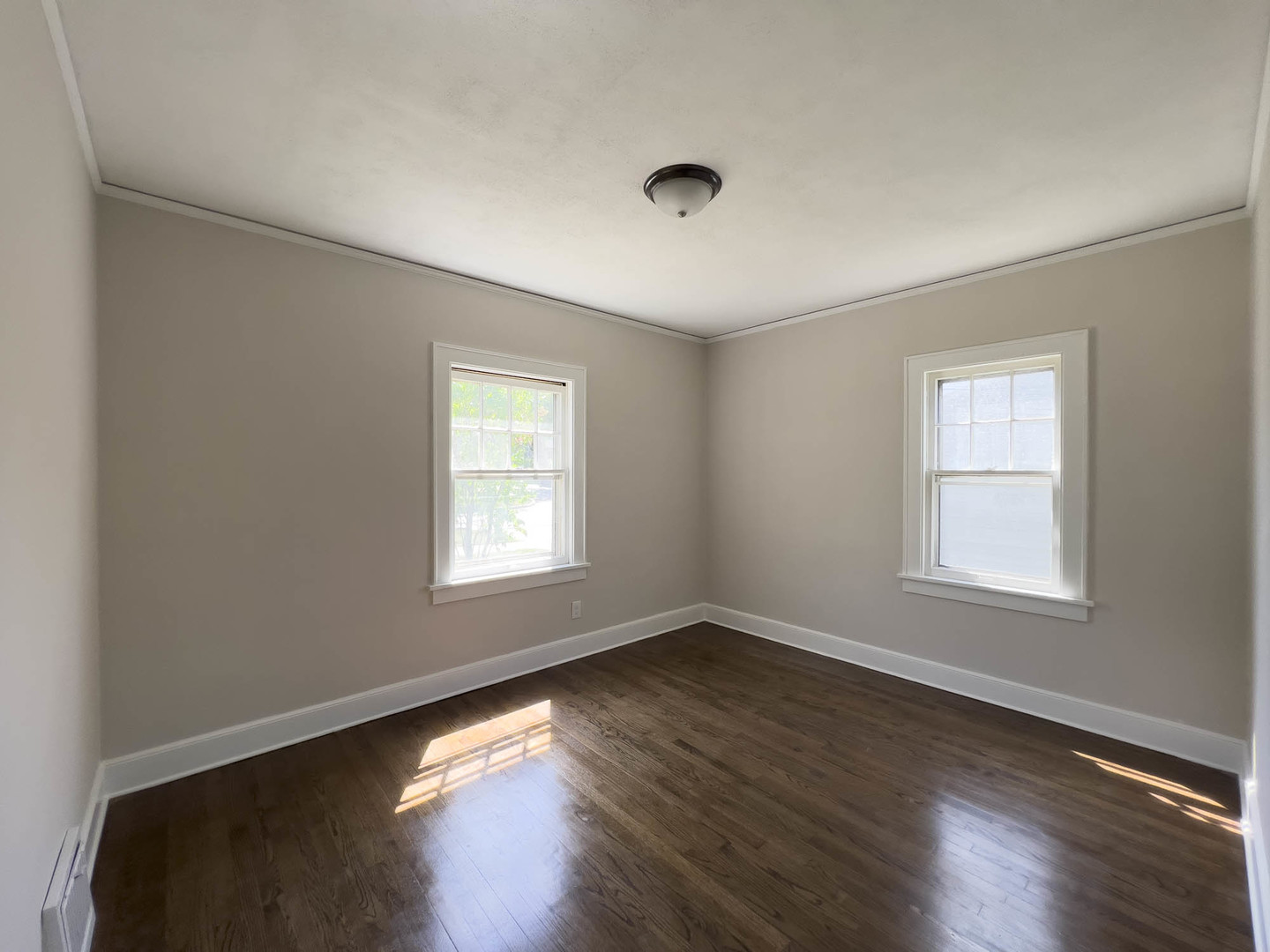 1214 Indiana Avenue St. Charles, IL 60174 - Photo 10 of 19 a view of an empty room with wooden floor and a window