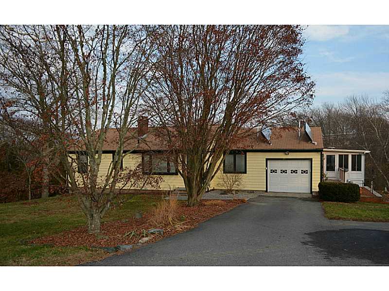 95 Long Meadow Road Portsmouth, RI 02871 - Photo 1 of 25 Exterior Front. Mature trees, extra parking, ramp in garage